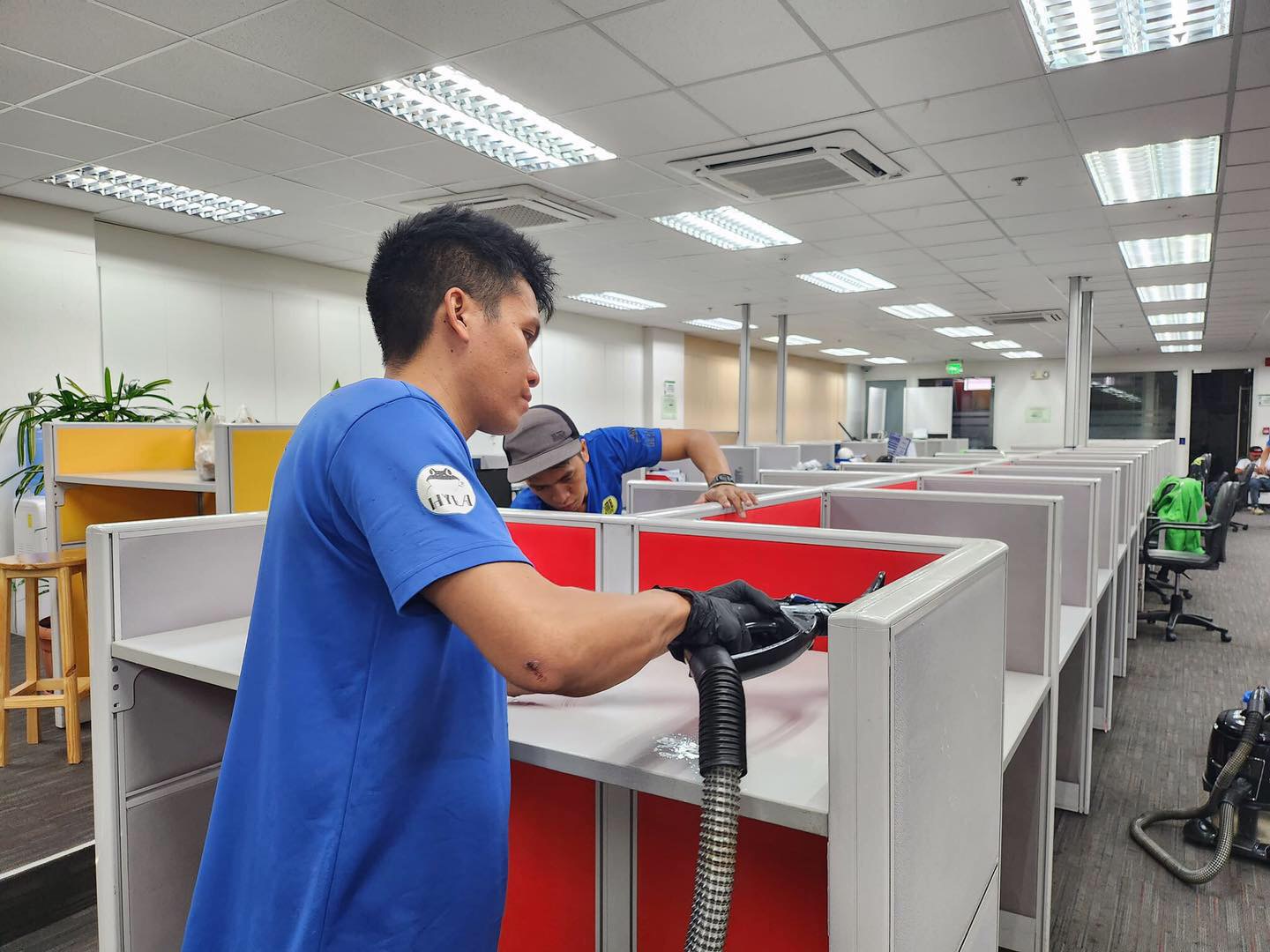 DMB cleaning team servicing office workstations